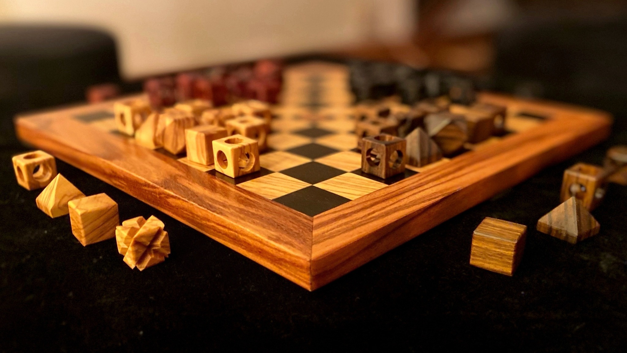 Dark Malki wooden pieces on the board
